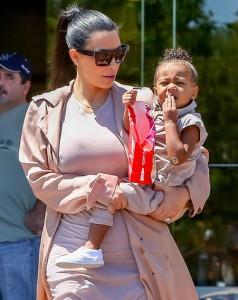 Pregnant KUWTK star ends up with some sticky sweet marks down her outfit after treating the 2 year old 