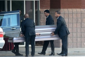 The coffin was carried into the church ahed of the service [splash]