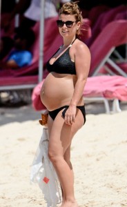 Coleen Rooney continued to show off her growing baby bump on holiday in Barbados [Splash]