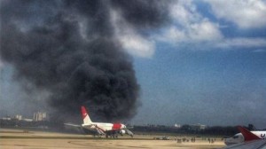 Media captionA plane caught fire on a runway at Fort Lauderdale airport in Florida