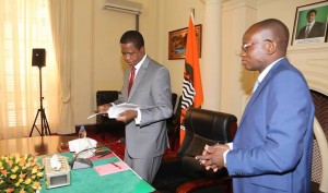 President Lungu with his special aide for Press and Public Relations Amos Chanda... Picture State House