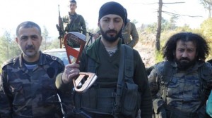  Turkmen rebels showed off what appear to be parts of a parachute near the northern Syrian village of Yamadi 