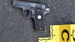 Police released a photo of a handgun that they say Mr Scott possessed 