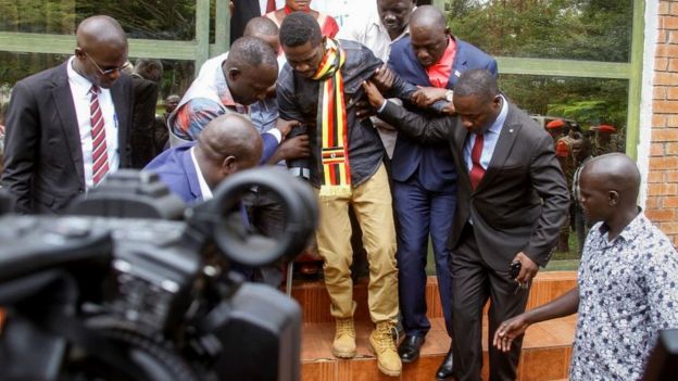  His family and lawyers allege Bobi Wine was assaulted in army custody 
