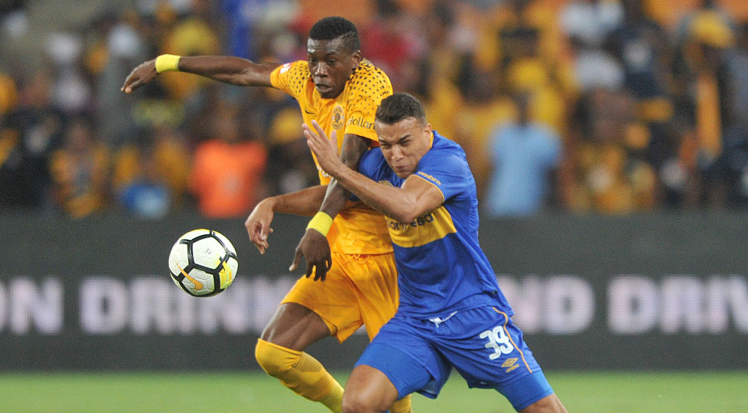 Teenage Hadebe of Kaizer Chiefs challenges Matthew Rusike of Cape Town City  during the Absa Premiership match between Kaizer Chiefs and Cape Town City on 17 February 2018 at  FNB Stadium Pic Sydney Mahlangu/BackpagePix